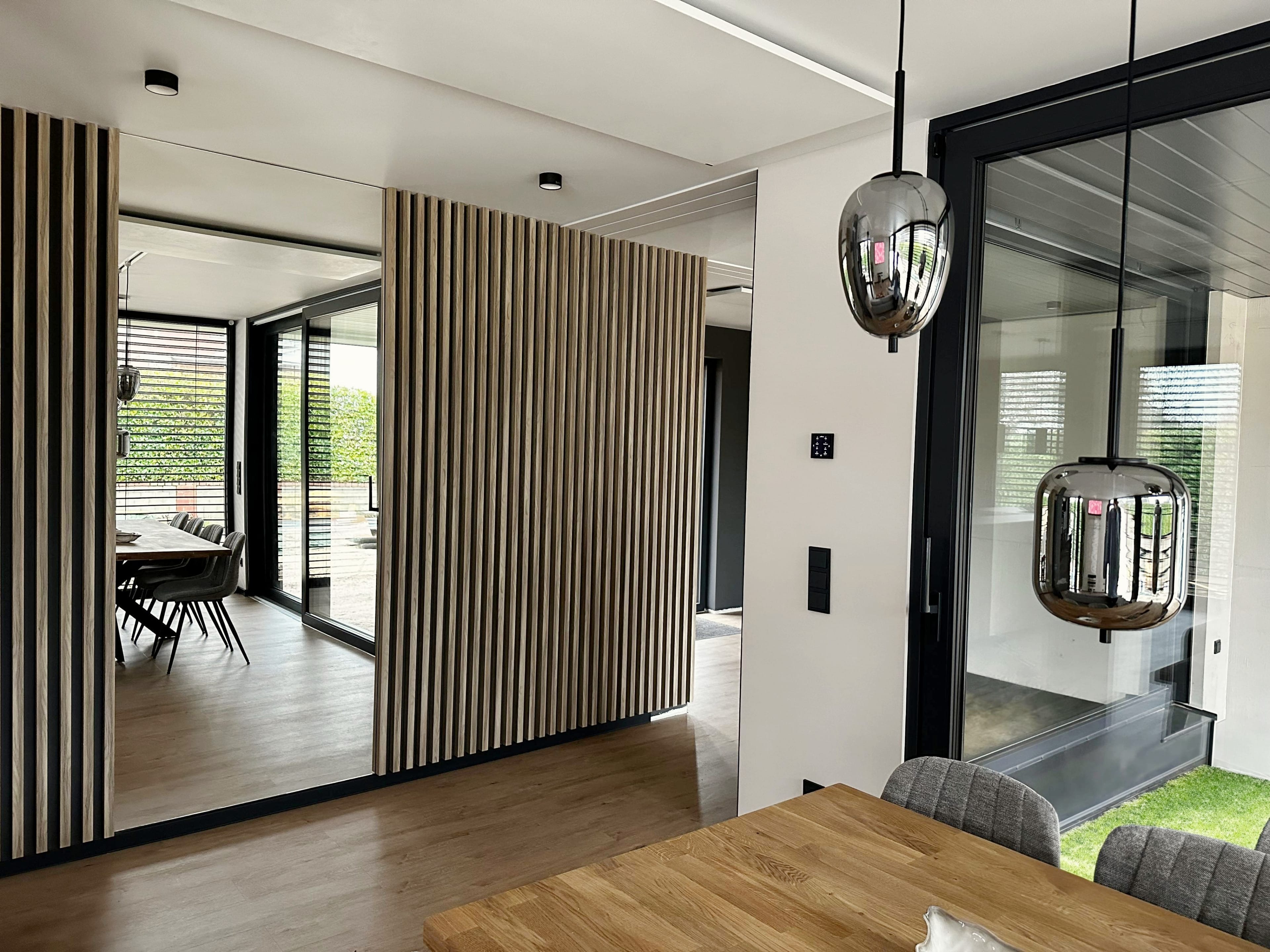 Rithum Switch In Contemporary Dining Room With Pendant Lighting